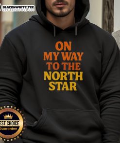 Cozy Nice-On-My-Way-To-The-North-Star-Hoodie displayed outdoors, showcasing its unique design and vibrant colors.