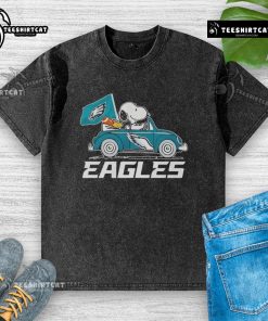 Alt Text: Philadelphia Eagles flag design featuring Snoopy and Woodstock driving a car on a stylish t-shirt.