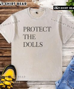 Alt Text: 2025 washed t-shirt featuring the slogan 'Protect The Dolls' for eco-conscious fashion enthusiasts.
