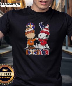 Alt Text: Snoopy and Charlie Brown in Houston sports Astros and Texans skyline graphic T-shirt design.