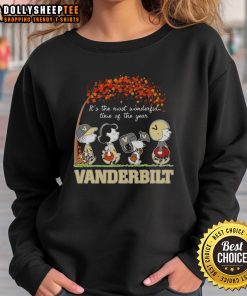 Cozy autumn sweatshirt featuring Snoopy and friends, perfect for the holiday season - 'It's the Most Wonderful Time of the Year.'