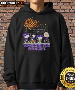 Alt Text: Cozy hoodie featuring Snoopy and friends, celebrating autumn with Washington Huskies theme - perfect for the season!