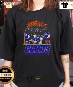 Autumn ladies tee featuring Snoopy and friends with New York Giants logo, perfect for sports fans this season.