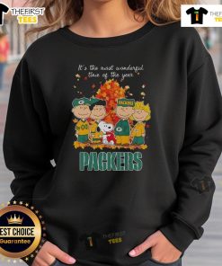 Alt Text: Cozy autumn sweatshirt featuring Snoopy and friends, perfect for Packers fans celebrating the most wonderful time of the year.