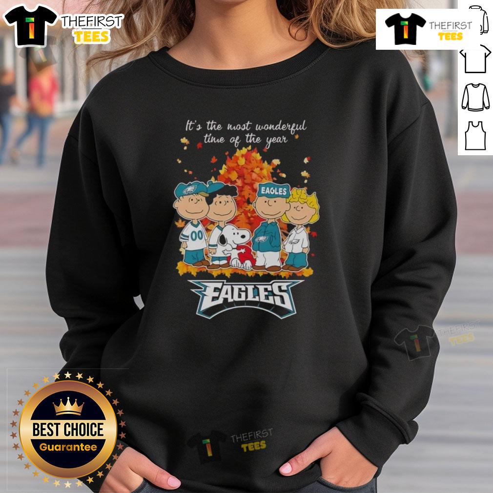Nice Snoopy And Friends X Philadelphia Eagles It's The Most Wonderful Time Of The Year Autumn Sweatshirt Alt Text: Nice Snoopy and Friends X Philadelphia Eagles autumn sweatshirt featuring festive design for the holiday season.