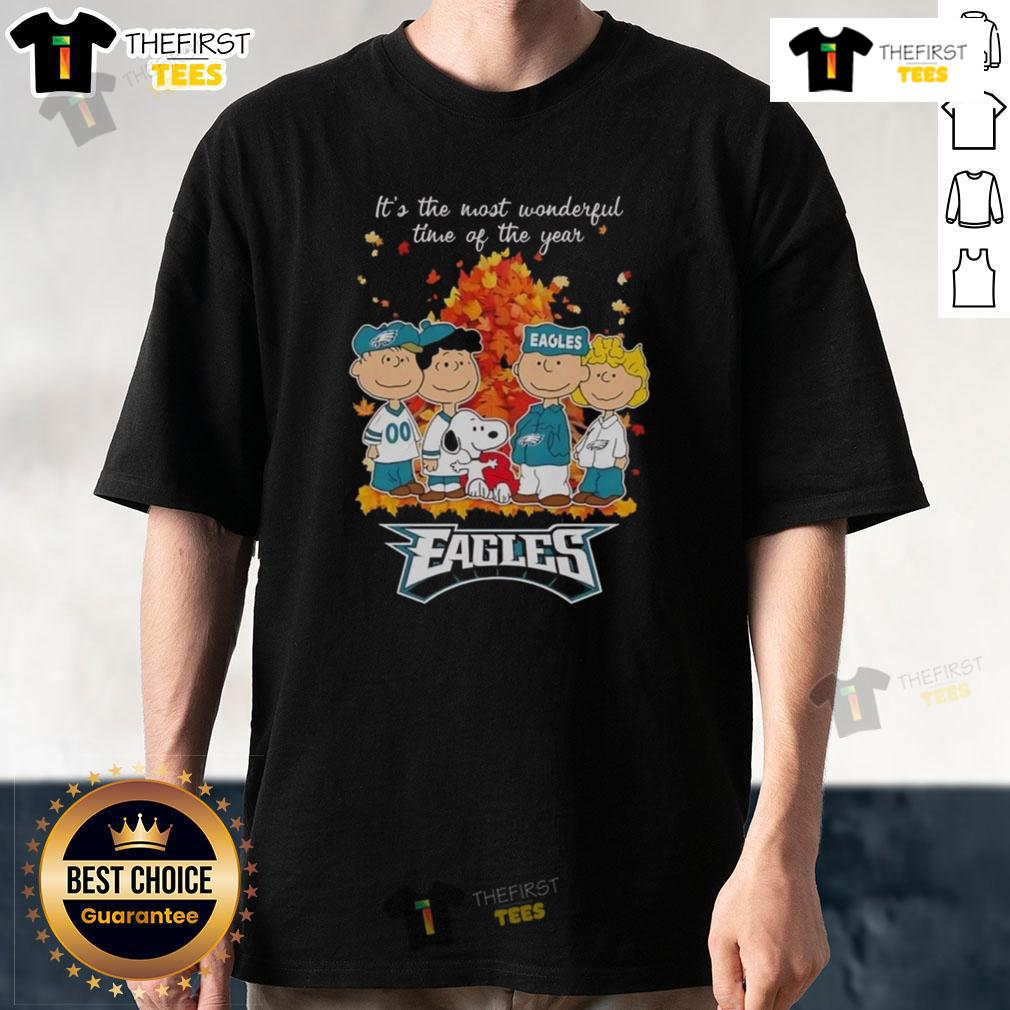 Nice Snoopy And Friends X Philadelphia Eagles It's The Most Wonderful Time Of The Year Autumn T-Shirt Alt Text: Nice Snoopy and Friends X Philadelphia Eagles T-shirt celebrating autumn with festive design for football fans.