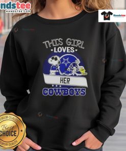 Alt Text: Girl wearing a Dallas Cowboys football helmet sweatshirt with Snoopy design, showcasing her team spirit.