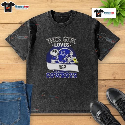Girl wearing a washed t-shirt with Snoopy and Dallas Cowboys football helmet, showcasing her love for the team.