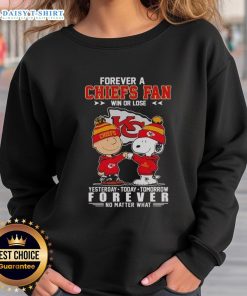 Snoopy and Charlie Brown graphic on 'Forever a Chiefs Fan' sweatshirt, perfect for fans of football and Peanuts.