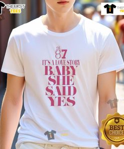 Alt Text: Nice Travis 87 It's A Love Story Baby She Said Yes T-Shirt in vibrant colors, perfect for romantic occasions.