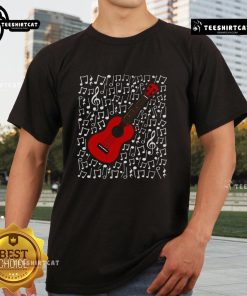 Alt Text: Ukulele player wearing a music teacher t-shirt with musical notes, perfect for musicians and ukulele enthusiasts.