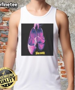 Lady Gaga in a stylish 'Nice Wednesday' tank top, showcasing her unique dance style and vibrant personality.