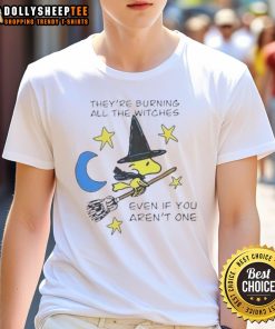Woodstock Halloween T-shirt featuring a witch graphic with a slogan about burning witches, perfect for Halloween celebrations.