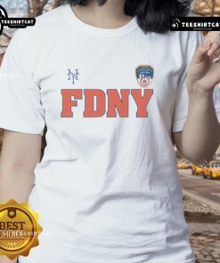 Alt Text: Official 2025 New York Mets FDNY 9/11 Ladies Tee featuring team logo and tribute design for fans and supporters.