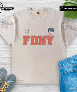Alt Text: Official 2025 New York Mets FDNY 9/11 Washed T-Shirt featuring a tribute design honoring first responders and the Mets.