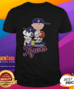 Alt Text: Official 2025 Peanuts Snoopy X Charlie Brown Detroit Tigers T-Shirt featuring colorful graphics of Snoopy and Charlie Brown.