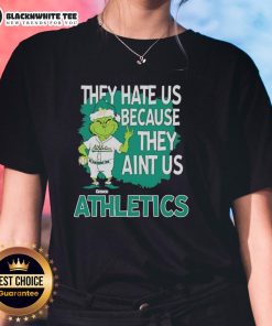 Official Athletics Grinch Christmas 'They Hate Us Ain't Us' ladies tee featuring festive design and vibrant colors.