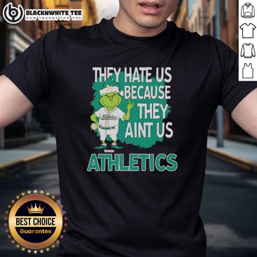 Alt Text: Official Athletics Grinch Christmas They Hate Us Ain't Us T-Shirt featuring a festive Grinch design and bold text.