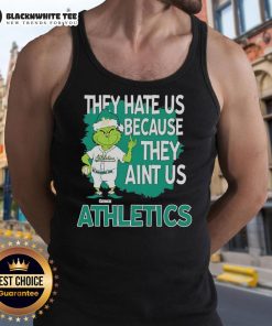 Official Athletics Grinch Christmas tank top with 'They Hate Us Ain't Us' slogan, perfect for festive workouts.