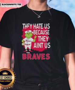 Official Atlanta Braves Grinch Christmas ladies tee featuring 'They Hate Us Ain't Us' design for holiday spirit.
