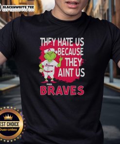 Alt Text: Official Atlanta Braves Grinch Christmas shirt featuring They Hate Us Ain't Us design for holiday fans.