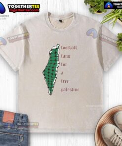 Alt Text: Official Becky Taylor Gill football fans wearing a Free Palestine washed t-shirt at a vibrant outdoor event.