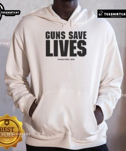 Charlie Kirk wearing 'Guns Save Lives' hoodie at 2018 event, promoting Second Amendment rights and personal freedom.