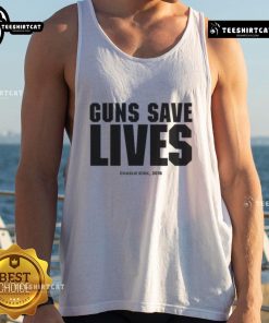 Charlie Kirk wearing a 'Guns Save Lives' tank top at an event in 2018, promoting Second Amendment rights.