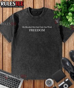 Charlie Kirk wearing a bloodied shirt with the word 'Freedom' displayed prominently, symbolizing his message.