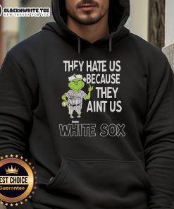 Official Chicago White Sox Grinch Christmas hoodie featuring 'They Hate Us Ain't Us' design for fans and holiday cheer.
