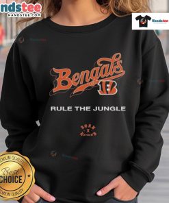 Official Cincinnati Bengals Born x Raised Rule The Jungle Sweatshirt featuring bold team graphics and a comfortable fit.