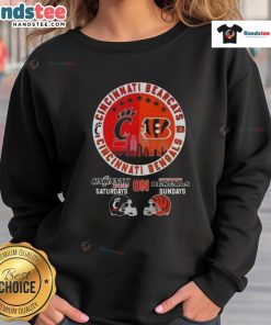 Alt Text: Cincinnati Bearcats sweatshirt featuring football helmets, perfect for game days on Bengals Sundays.