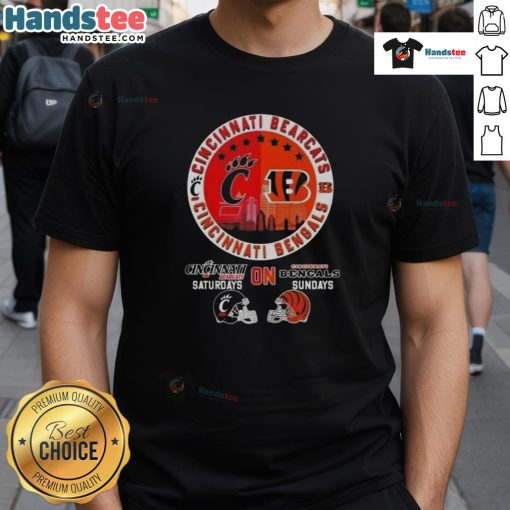 Alt Text: Official Cincinnati Sports Bearcats T-shirt featuring football helmets and skyline for Bengals Sundays.