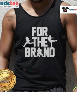 Alt Text: Official Cleveland Browns For The Brand tank top featuring team colors and logo, perfect for fans.