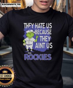 Official Colorado Rockies Grinch Christmas T-Shirt featuring 'They Hate Us Ain't Us' design for festive fans.