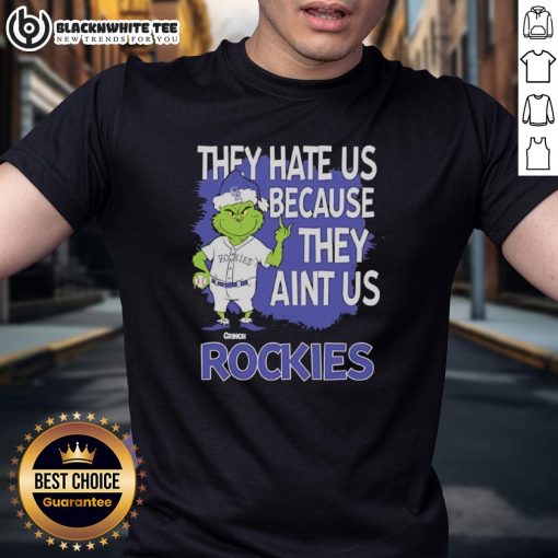 Official Colorado Rockies Grinch Christmas T-Shirt featuring 'They Hate Us Ain't Us' design for festive fans.