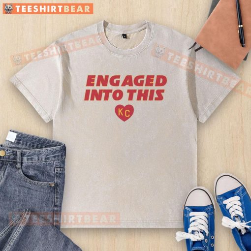 Official Engaged Into This KC Travis Kelce and Taylor Wash T-Shirt featuring vibrant graphics and trendy design.