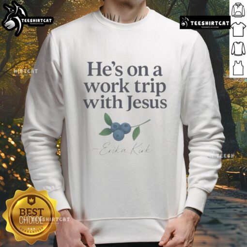 Alt Text: Erika Kirk wearing a faith-based Christian sweatshirt, 'He's On A Work Trip With Jesus,' showcasing stylish comfort.