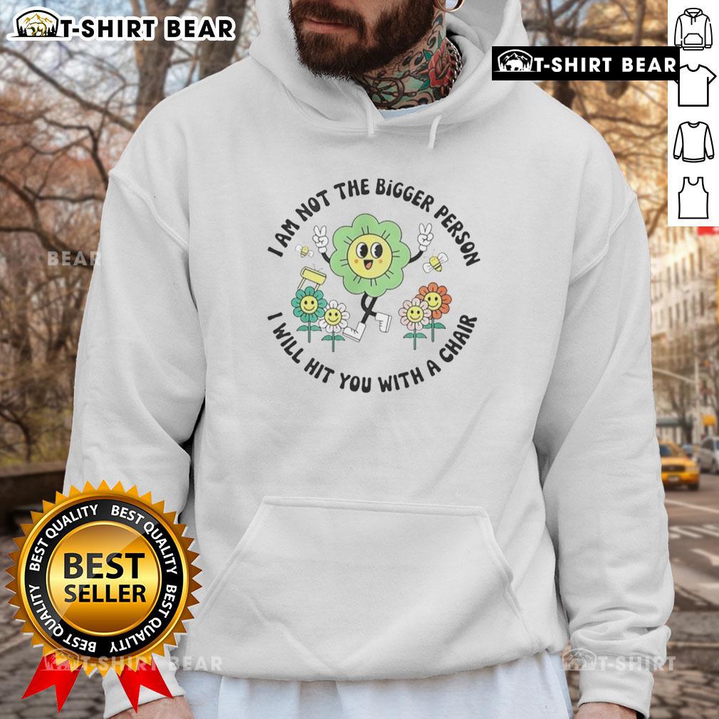 Official I Am Not The Bigger Person I Will Hit You With A Chair Hoodie Official 'I Am Not The Bigger Person, I Will Hit You With A Chair' hoodie in black, featuring bold white text design.