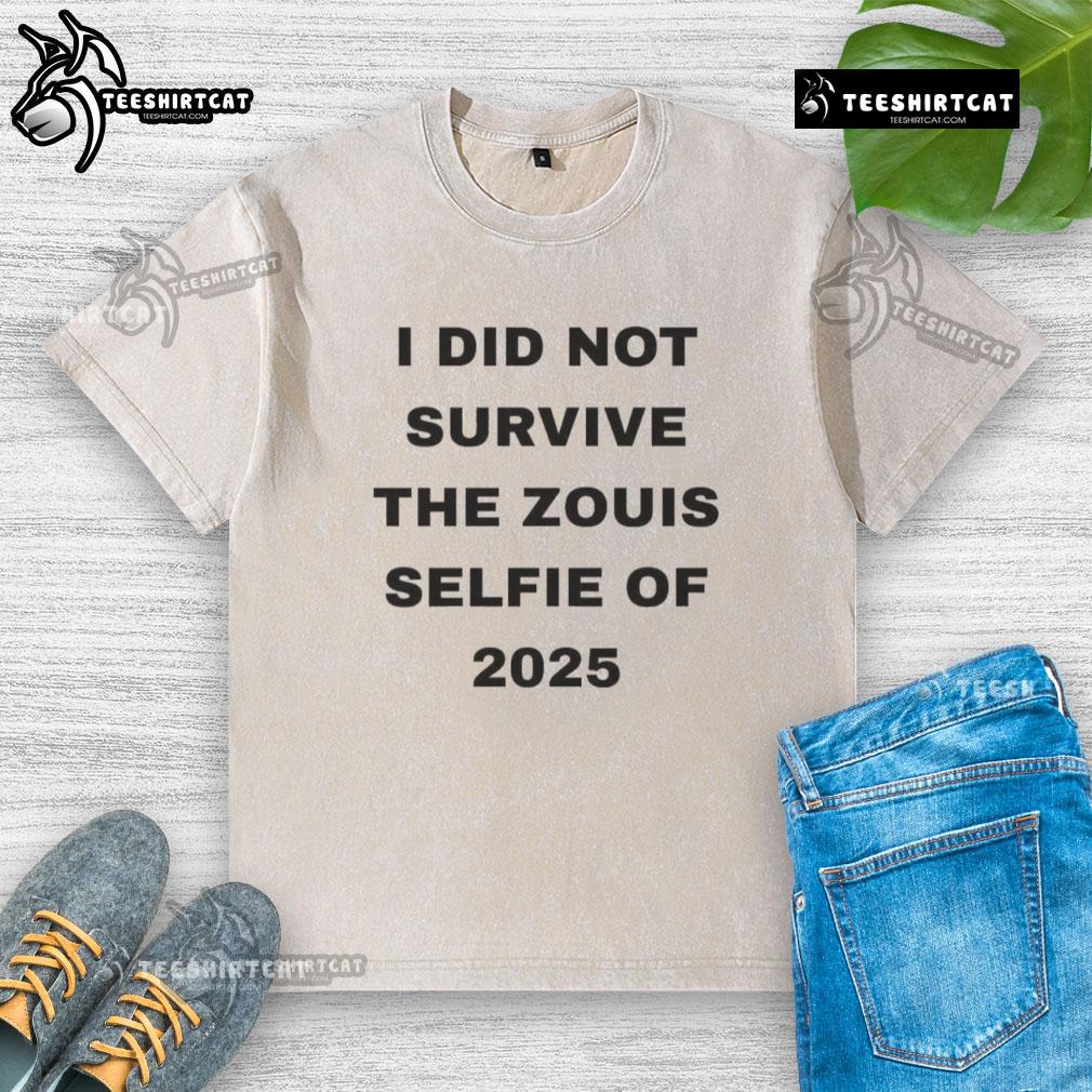 Official I Did Not Survive The Zouis Selfie Of 2025 Washed T Shirt Official I Did Not Survive The Zouis Selfie of 2025 washed t-shirt displayed on a hanger in a trendy boutique.