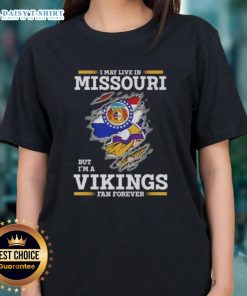 Official I May Live In Missouri But I'm A Minnesota Vikings Fan Forever Ladies Tee featuring team colors and logo.
