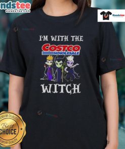 Official 'I'm With The Costco Wholesale Witch' Halloween ladies tee with playful witch graphic for festive fun.