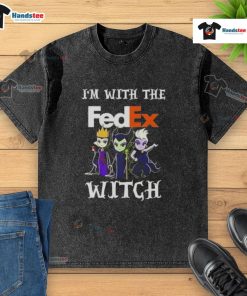 Official 'I'm With The FedEx Witch' Halloween Villains washed t-shirt featuring a spooky design for festive fun.