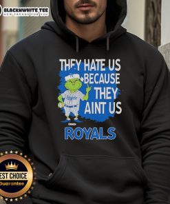 Official Kansas City Royals Grinch Christmas hoodie featuring 'They Hate Us Ain't Us' design for festive fans.