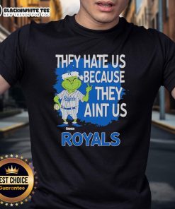 Official Kansas City Royals Grinch Christmas T-Shirt featuring 'They Hate Us Ain't Us' design for festive fans.