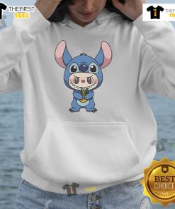 Official Labubu in Lilo and Stitch costume, holding a pineapple hoodie, showcasing a fun and vibrant Disney-inspired outfit.