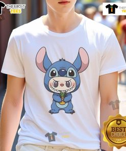Alt Text: Official Labubu in Lilo and Stitch costume holding a pineapple t-shirt, showcasing a fun and vibrant tropical look.