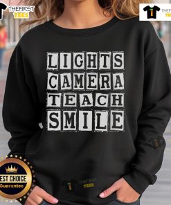 Cozy Official Lights Camera Teach Sweatshirt in vibrant color, perfect for educators who love style and comfort.