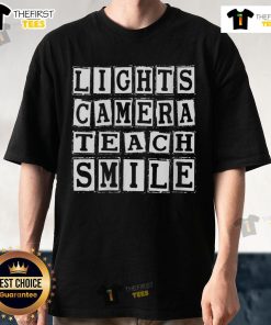 Official Lights Camera Teach Smile T-Shirt featuring a vibrant design for teachers who inspire and motivate students.