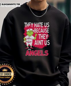 Official Los Angeles Angels Grinch Christmas sweatshirt featuring 'They Hate Ain't Us' design, perfect for holiday fans.